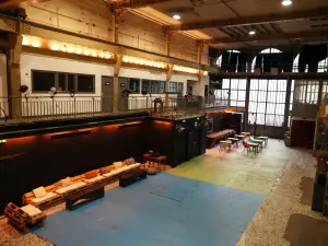 An industrial room equipped for all types of meetings and events