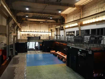 An industrial room equipped for all types of meetings and events