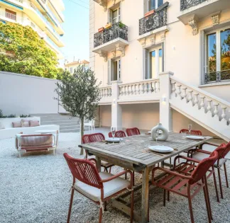 Chic 3-Bedroom Cannes Apartment with Garden Near Palais