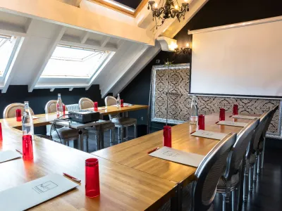 An elegant and intimate meeting room with baroque decor