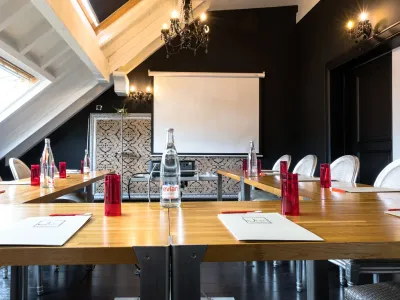 An elegant and intimate meeting room with baroque decor