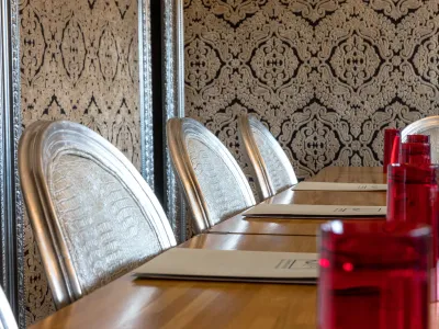 An elegant and intimate meeting room with baroque decor