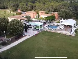 An enchanting setting between vineyards and pine forests.