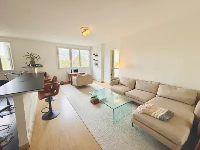 Bright living room with open-plan kitchen