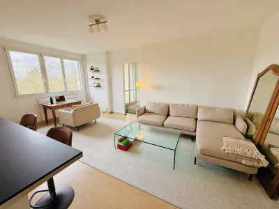 Bright living room with open-plan kitchen