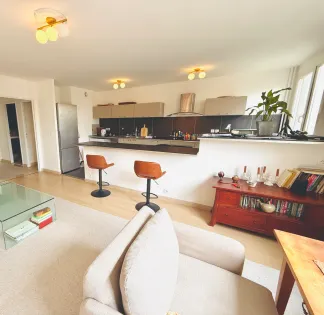 Bright living room with open-plan kitchen