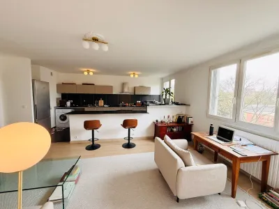 Bright living room with open-plan kitchen