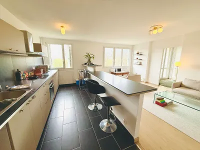 Bright living room with open-plan kitchen