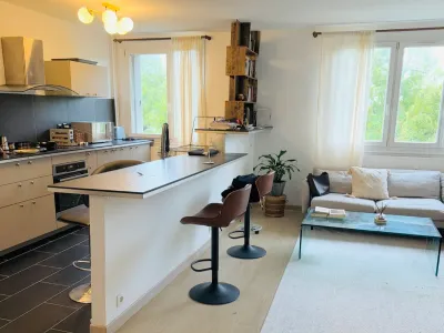 Bright living room with open-plan kitchen
