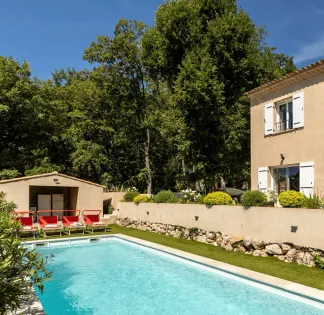 Heated swimming pool in a green garden