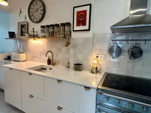 Maison en pierre meulière à 15 min de Paris