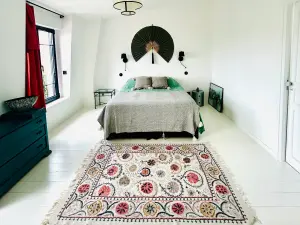 Maison en pierre meulière à 15 min de Paris