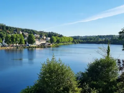 Beautiful lakeside garden with large wooden terrace overlooking the water