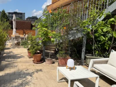 Terrasse rénovée avec vue sur le stade San Siro à Milan