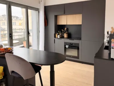 Triplex avec Terrasse sur le Toit et Vue sur le Sacré-Cœur à Paris