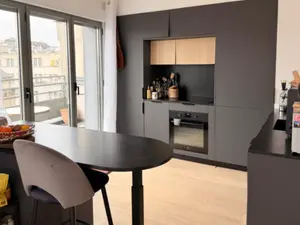 Triplex avec Terrasse sur le Toit et Vue sur le Sacré-Cœur à Paris