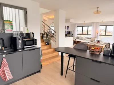 Triplex avec Terrasse sur le Toit et Vue sur le Sacré-Cœur à Paris
