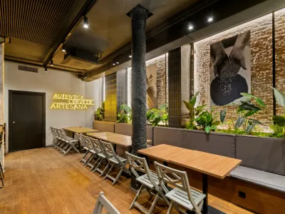 Premium Industrial Event Space with Stone Arches & Cocktail Bar in Barcelona