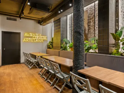 Premium Industrial Event Space with Stone Arches & Cocktail Bar in Barcelona