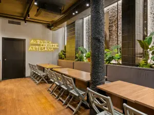 Premium Industrial Event Space with Stone Arches & Cocktail Bar in Barcelona