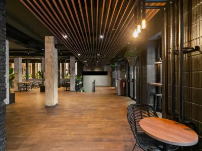 Premium Industrial Event Space with Stone Arches & Cocktail Bar in Barcelona