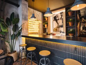 Premium Industrial Event Space with Stone Arches & Cocktail Bar in Barcelona