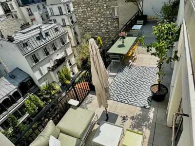 Duplex Parisien avec Terrasses pour Événements à Paris