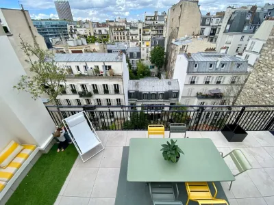 Duplex Parisien avec Terrasses pour Événements à Paris