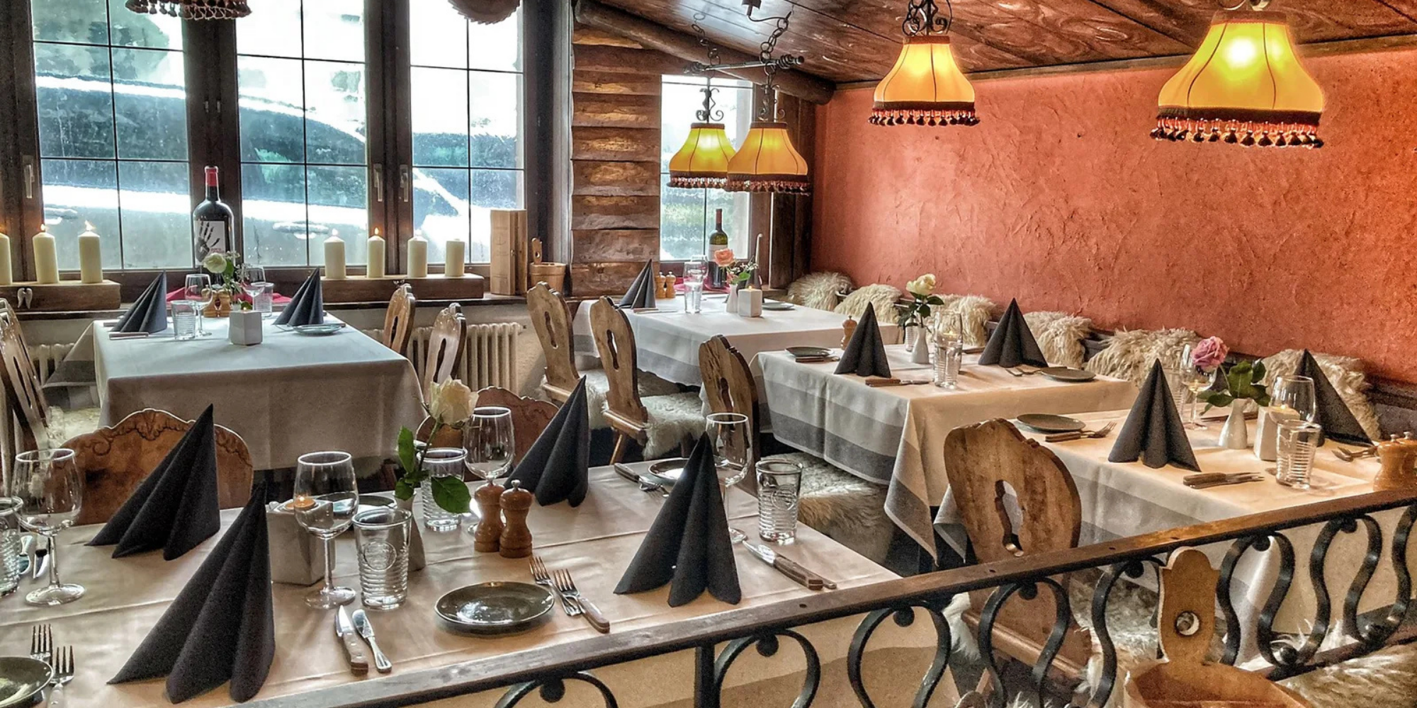 Alpine grill restaurant with wooden interiors in Davos