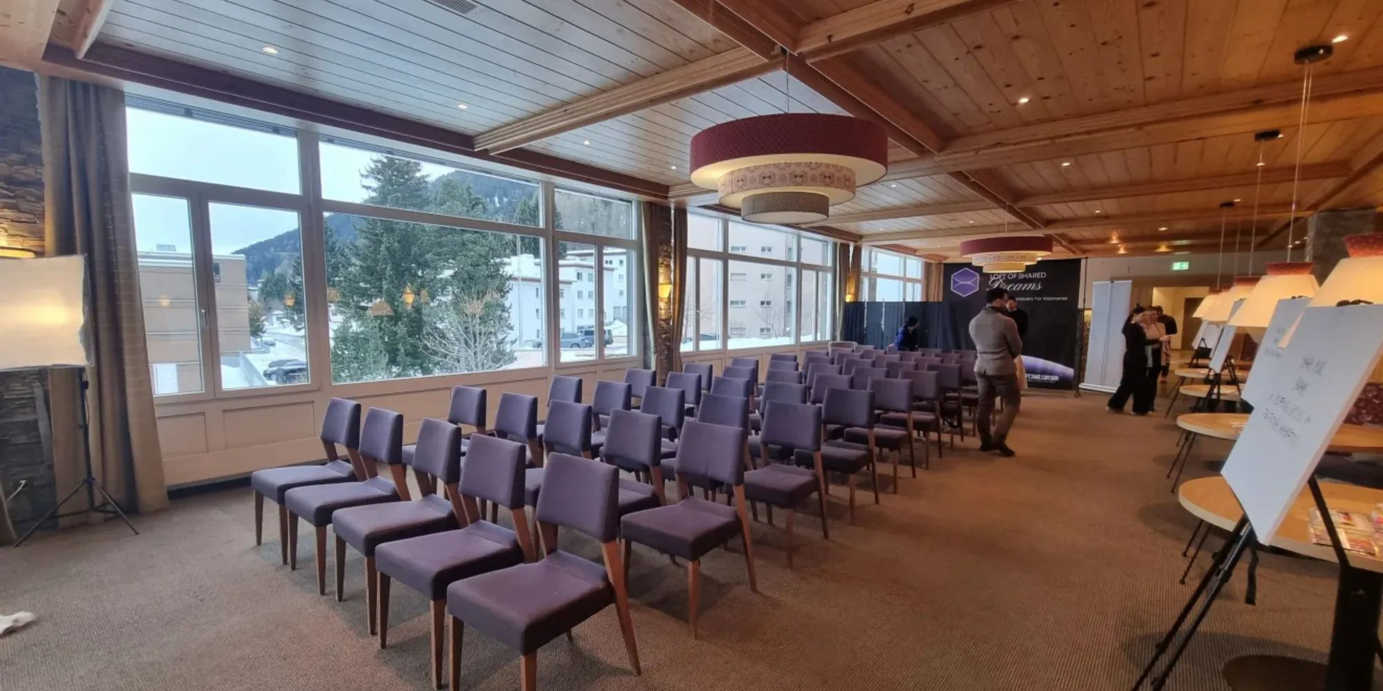 Event space with wood-panelled ceilings and mountain views in Davos