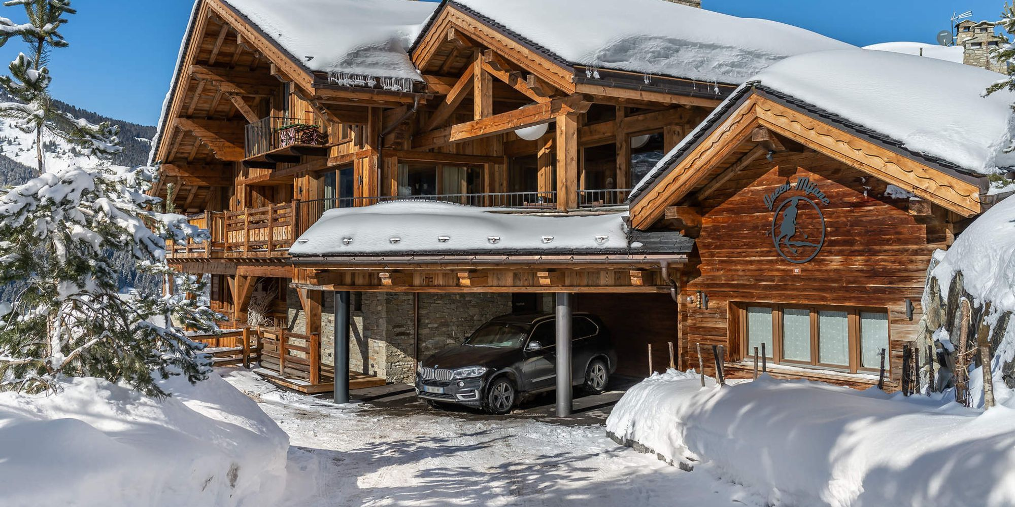 Luxury alpine chalet in Méribel Village with terraces and pool