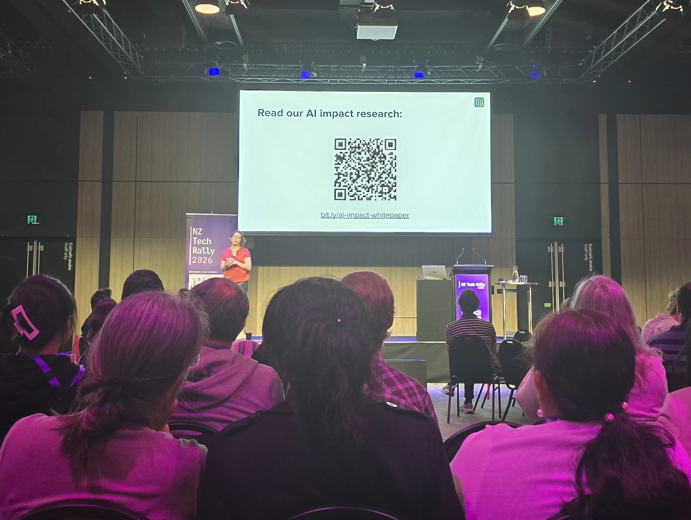 Lauren Peate presenting AI impact research at NZTechRally